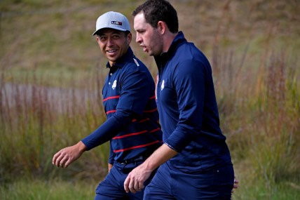 Sep 24, 2021; Haven, Wisconsin, USA; Team USA player Xander Schauffele and Team USA player Patrick Cantlay on the 15th hole during day one four ball matches for the 43rd Ryder Cup golf competition at Whistling Straits. Mandatory Credit: Orlando Ramirez-USA TODAY Sports