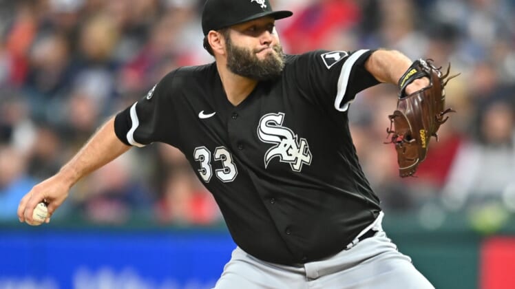 Sep 24, 2021; Cleveland, Ohio, USA; Chicago White Sox starting pitcher Lance Lynn (33) throws a pitch during the first inning against the Cleveland Indians at Progressive Field. Mandatory Credit: Ken Blaze-USA TODAY Sports