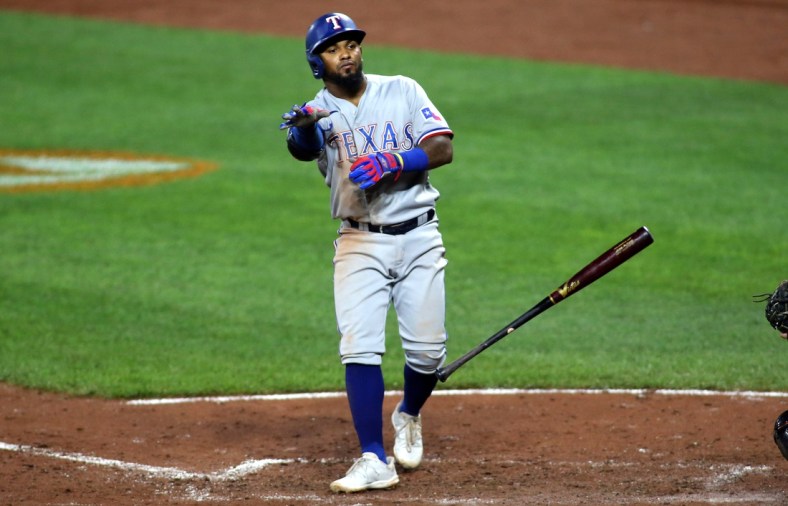Sept. 25, 2021; Baltimore, Maryland, USA; Texas Rangers second baseman Yonny Hernandez (65) flips his bat after drawing a walk against the Baltimore Orioles during the seventh inning at Oriole Park at Camden Yards. Mandatory Credit: Daniel Kucin Jr.-USA TODAY Sports
