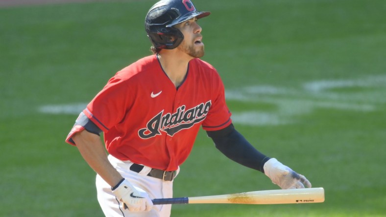 Sep 27, 2021; Cleveland, Ohio, USA; Cleveland Indians right fielder Bradley Zimmer (4) watches his solo home run in the eighth inning against the Kansas City Royals at Progressive Field. Mandatory Credit: David Richard-USA TODAY Sports