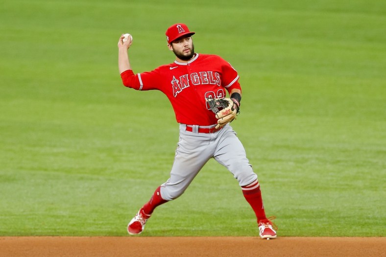 Sep 29, 2021; Arlington, Texas, USA; Los Angeles Angels second baseman David Fletcher (22) fields a ground ball during the fourth inning against the Texas Rangers at Globe Life Field. Mandatory Credit: Andrew Dieb-USA TODAY Sports
