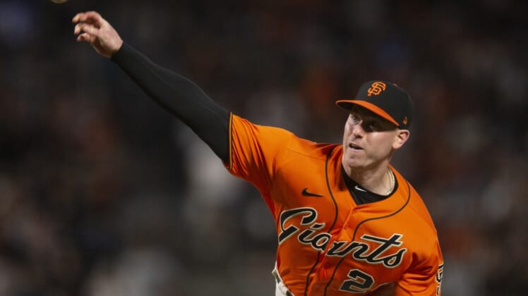 Oct 1, 2021; San Francisco, California, USA; San Francisco Giants starting pitcher Anthony DeSclafani(26) delivers a pitch against the San Diego Padres during the second inning at Oracle Park. Mandatory Credit: D. Ross Cameron-USA TODAY Sports