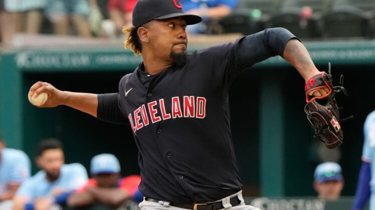 Oct 3, 2021; Arlington, Texas, USA; Cleveland Indians relief pitcher Emmanuel Clase (48) delivers the final pitch of the game against the Texas Rangers during the ninth inning at Globe Life Field. The MLB club known as the Indians will be named the Cleveland Guardians at the start of the 2022 season. Mandatory Credit: The Indians won 6-0. Jim Cowsert-USA TODAY Sports