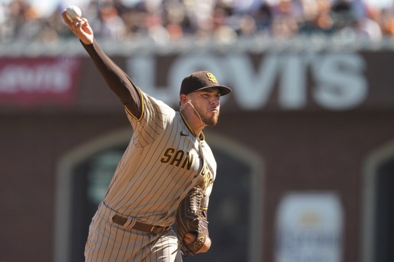 Oct 2, 2021; San Francisco, California, USA; San Diego Padres starting pitcher Joe Musgrove (44) throws a pitch during the second inning against the San Francisco Giants at Oracle Park. Mandatory Credit: Darren Yamashita-USA TODAY Sports