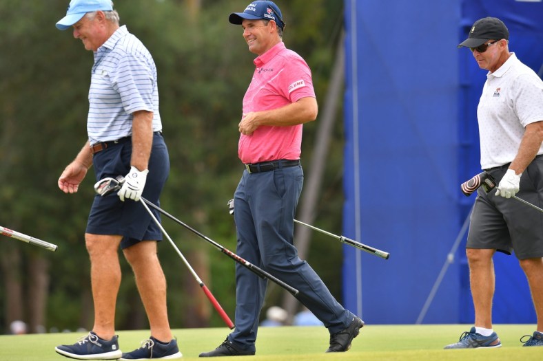 Padraig Harrington walks off the green on hole 17 with playing partners after putting in during Wednesday's Constellation & Friends Pro-Am event at the , October 6, 2021 at the golf course of the Timuquana Country Club in Jacksonville, FL.

Jki 100621 Furykfriendsgolf 04