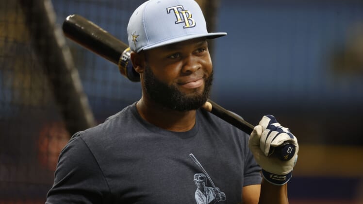 Oct 6, 2021; Tampa, Florida, USA;Tampa Bay Rays right fielder Manuel Margot (13)  works out for ALDS workout day against the Boston Red Sox at Tropicana Field. Mandatory Credit: Kim Klement-USA TODAY Sports