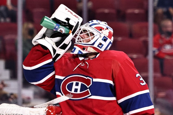 Oct 7, 2021; Montreal, Quebec, CAN; Montreal Canadiens goaltender Carey Price (31) drinks during the third period against Ottawa Senators at Bell Centre. Mandatory Credit: Jean-Yves Ahern-USA TODAY Sports