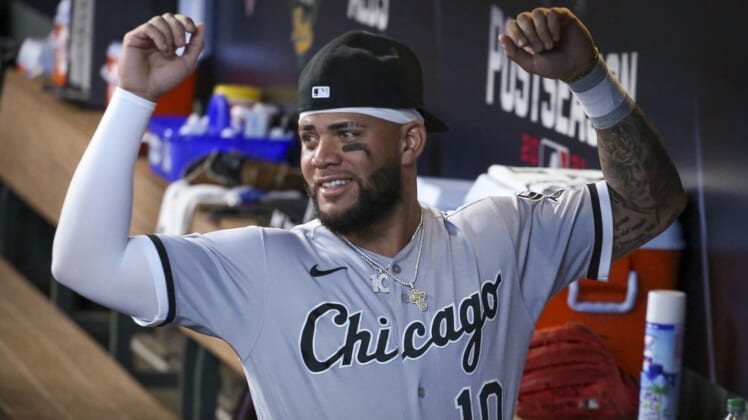 Oct 8, 2021; Houston, Texas, USA; Chicago White Sox third baseman Yoan Moncada (10) plays in the dugout before playing agains the Houston Astros before game two of the 2021 ALDS at Minute Maid Park. Mandatory Credit: Thomas Shea-USA TODAY Sports