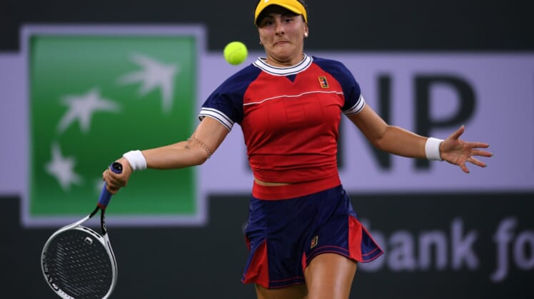 Oct 9, 2021; Indian Wells, CA, USA; Bianca Andreescu (CAN) hits a shot against Alison Riske (USA) at Indian Wells Tennis Garden. Mandatory Credit: Orlando Ramirez-USA TODAY Sports