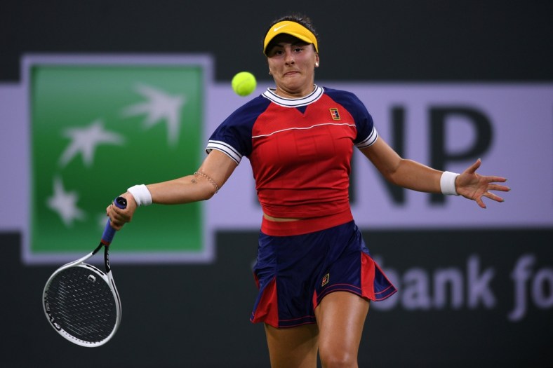 Oct 9, 2021; Indian Wells, CA, USA; Bianca Andreescu (CAN) hits a shot against Alison Riske (USA) at Indian Wells Tennis Garden. Mandatory Credit: Orlando Ramirez-USA TODAY Sports