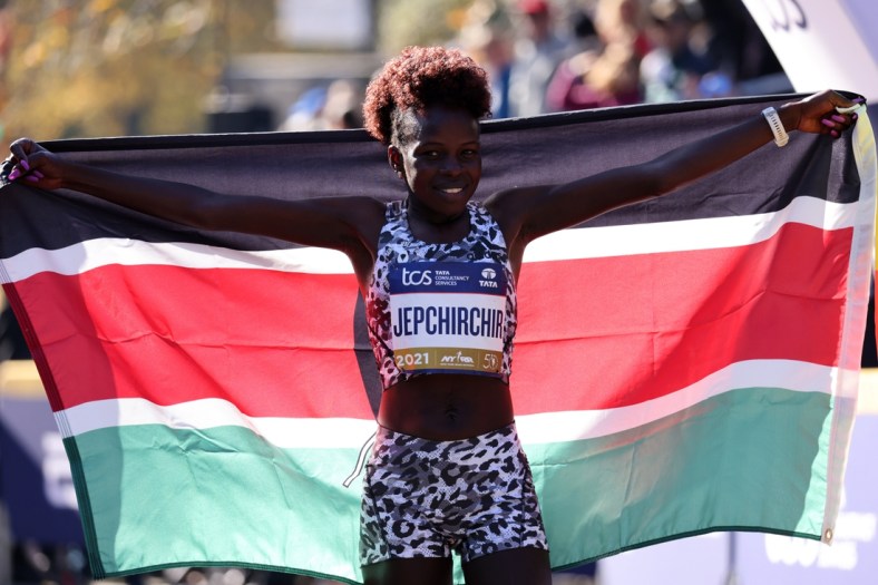 Nov 7, 2021; New York, New York, USA;  Peres Jepchirchir, of Kenya, crossed the finish line in first place with a time of 2:22:39 at the New York City Marathon.   Mandatory Credit: Kevin R. Wexler-USA TODAY Sports