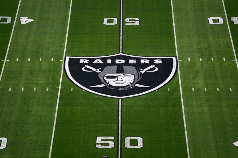 Nov 14, 2021; Paradise, Nevada, USA; A detailed view of the Las Vegas Raiders shield logo at midfield at Allegiant Stadium. Mandatory Credit: Kirby Lee-USA TODAY Sports