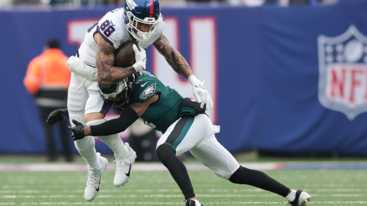 Nov 28, 2021; East Rutherford, New Jersey, USA; New York Giants tight end Evan Engram (88) gains yards after the catch as Philadelphia Eagles cornerback Steven Nelson (3) tackles during the second half at MetLife Stadium. Mandatory Credit: Vincent Carchietta-USA TODAY Sports