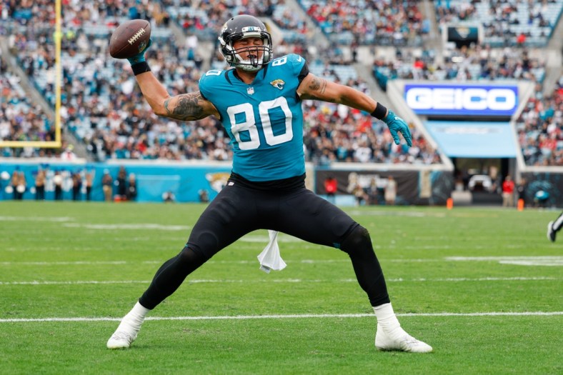 Nov 28, 2021; Jacksonville, Florida, USA;  Jacksonville Jaguars tight end James O'Shaughnessy (80) celebrates after scoring on a two point conversion in the second half against the Atlanta Falcons at TIAA Bank Field. Mandatory Credit: Nathan Ray Seebeck-USA TODAY Sports