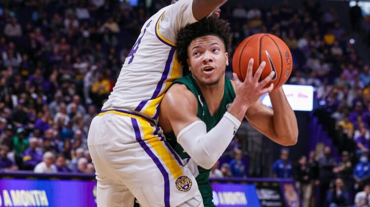 Dec 1, 2021; Baton Rouge, Louisiana, USA;  Ohio Bobcats guard Mark Sears (1) drives to the basket against LSU Tigers forward Darius Days (4) during the second half at Pete Maravich Assembly Center. Mandatory Credit: Stephen Lew-USA TODAY Sports