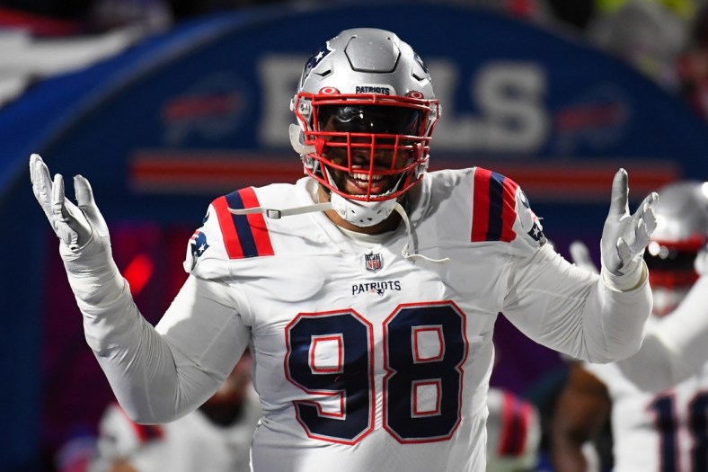 Dec 6, 2021; Orchard Park, New York, USA; New England Patriots defensive tackle Carl Davis (98) gestures to the crowd prior to the game against the Buffalo Bills at Highmark Stadium. Mandatory Credit: Rich Barnes-USA TODAY Sports