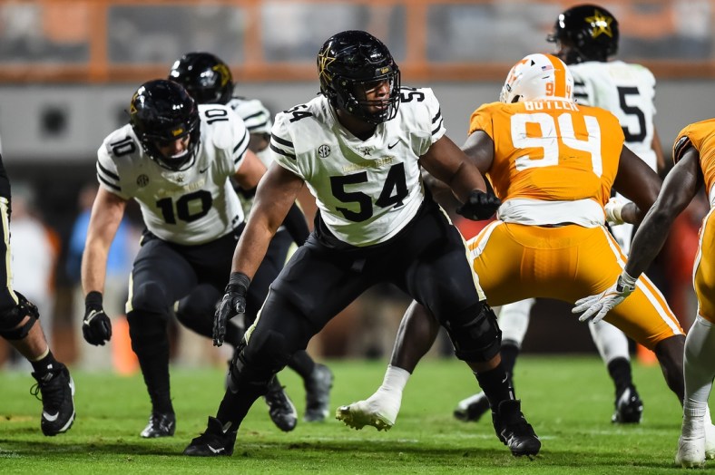 Nov 27, 2021; Knoxville, Tennessee, USA; Vanderbilt Commodores offensive lineman Tyler Steen (54) blocks during the second half against the Tennessee Volunteers at Neyland Stadium. Mandatory Credit: Bryan Lynn-USA TODAY Sports