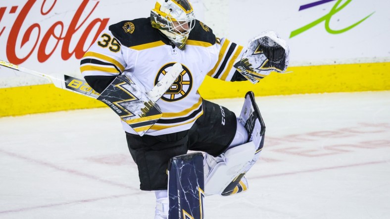 Dec 11, 2021; Calgary, Alberta, CAN; Boston Bruins goaltender Linus Ullmark (35) celebrate win over Calgary Flames at Scotiabank Saddledome. Mandatory Credit: Sergei Belski-USA TODAY Sports