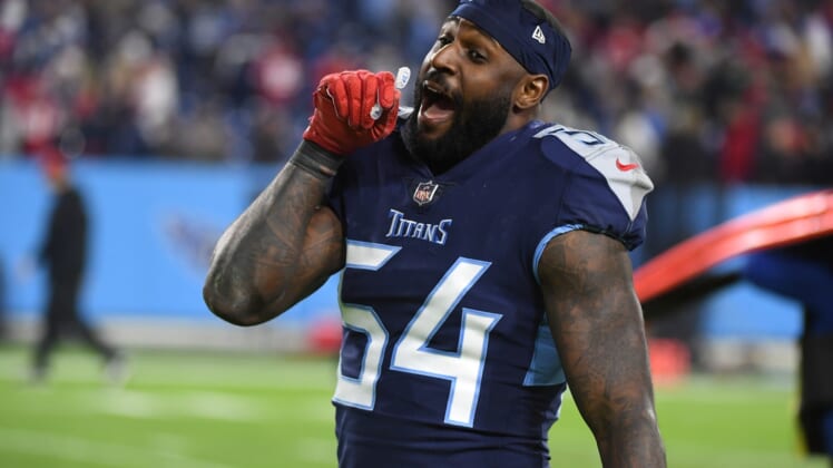 Dec 23, 2021; Nashville, Tennessee, USA; Tennessee Titans inside linebacker Rashaan Evans (54) celebrates as he leaves the field after a win against the San Francisco 49ers at Nissan Stadium. Mandatory Credit: Christopher Hanewinckel-USA TODAY Sports