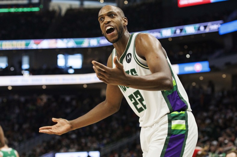 Dec 25, 2021; Milwaukee, Wisconsin, USA;  Milwaukee Bucks forward Khris Middleton (22) reacts after being called for a foul during the second quarter against tbe Boston Celtics at Fiserv Forum. Mandatory Credit: Jeff Hanisch-USA TODAY Sports