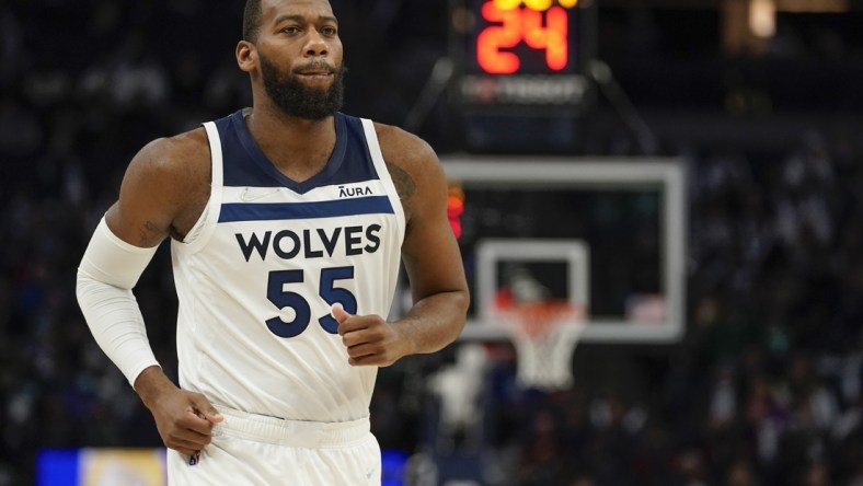 Dec 27, 2021; Minneapolis, Minnesota, USA; Minnesota Timberwolves center Greg Monroe (55) looks on against the Boston Celtics during the third quarter at Target Center. Mandatory Credit: Nick Wosika-USA TODAY Sports