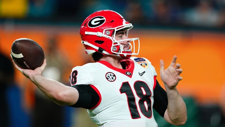 Dec 31, 2021; Miami Gardens, FL, USA; Georgia Bulldogs quarterback JT Daniels (18) warms up prior to the Orange Bowl college football CFP national semifinal game against the Michigan Wolverines at Hard Rock Stadium. Mandatory Credit: John David Mercer-USA TODAY Sports