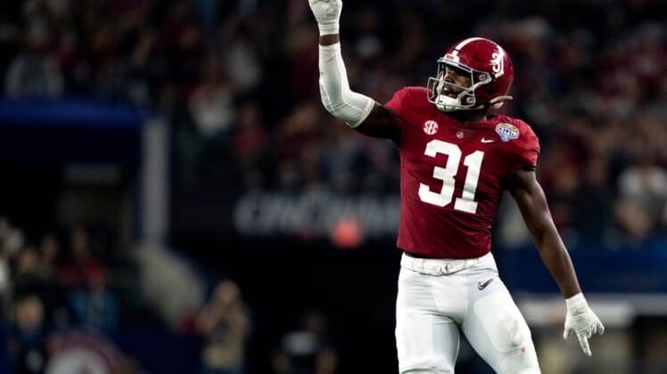 Alabama Crimson Tide linebacker Will Anderson Jr. (31) celebrates after a defensive stop on fourth down in the second half the NCAA Playoff Semifinal at the Goodyear Cotton Bowl Classic on Friday, Dec. 31, 2021, at AT&T Stadium in Arlington, Texas. Alabama Crimson Tide defeated Cincinnati Bearcats 27-6.Cotton Bowl Cincinnati Bearcats Alabama Crimson Tide Ac 428