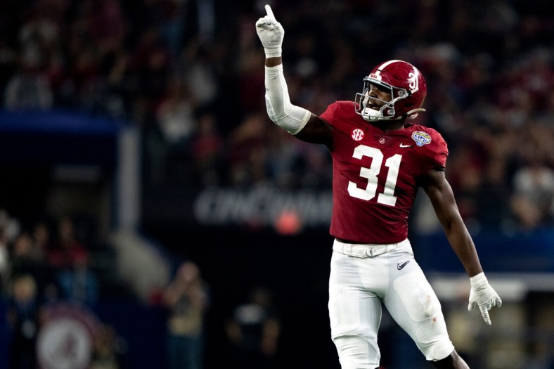 Alabama Crimson Tide linebacker Will Anderson Jr. (31) celebrates after a defensive stop on fourth down in the second half the NCAA Playoff Semifinal at the Goodyear Cotton Bowl Classic on Friday, Dec. 31, 2021, at AT&T Stadium in Arlington, Texas. Alabama Crimson Tide defeated Cincinnati Bearcats 27-6.

Cotton Bowl Cincinnati Bearcats Alabama Crimson Tide Ac 428