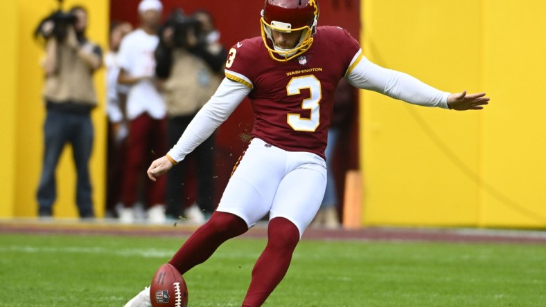 Jan 2, 2022; Landover, Maryland, USA; Washington Football Team kicker Joey Slye (3) kicks off against the Philadelphia Eagles during the first half  at FedExField. Mandatory Credit: Brad Mills-USA TODAY Sports