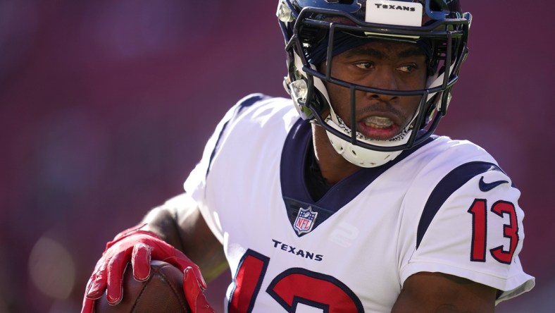 Jan 2, 2022; Santa Clara, California, USA; Houston Texans wide receiver Brandin Cooks (13) runs with the ball before the start of the game against the San Francisco 49ers at Levi's Stadium. Mandatory Credit: Cary Edmondson-USA TODAY Sports