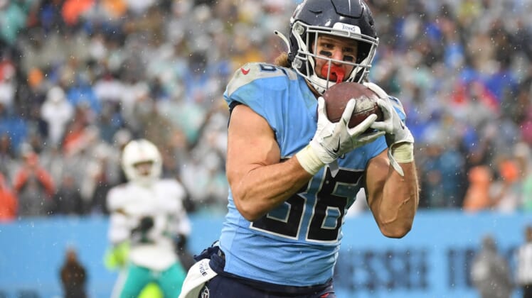 Jan 2, 2022; Nashville, Tennessee, USA; Tennessee Titans tight end Anthony Firkser (86) catches a touchdown pass during the second half against the Miami Dolphins at Nissan Stadium. Mandatory Credit: Christopher Hanewinckel-USA TODAY Sports
