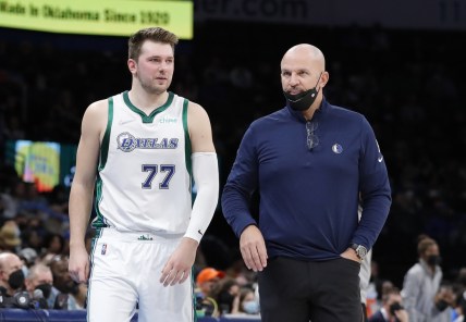 Jan 2, 2022; Oklahoma City, Oklahoma, USA; Dallas Mavericks guard Luka Doncic (77) and head coach Jason Kidd (right) talk between plays against the Oklahoma City Thunder during the second quarter at Paycom Center. Mandatory Credit: Alonzo Adams-USA TODAY Sports