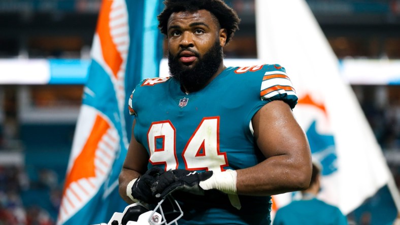 Jan 9, 2022; Miami Gardens, Florida, USA; Miami Dolphins defensive end Christian Wilkins (94) watches from the field after the game against the New England Patriots at Hard Rock Stadium. Mandatory Credit: Sam Navarro-USA TODAY Sports