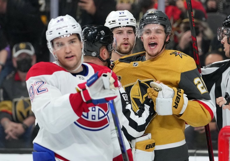 Jan 20, 2022; Las Vegas, Nevada, USA; Vegas Golden Knights center Brett Howden (21) shouts at Montreal Canadiens left wing Jonathan Drouin (92) during the second period at T-Mobile Arena. Mandatory Credit: Stephen R. Sylvanie-USA TODAY Sports