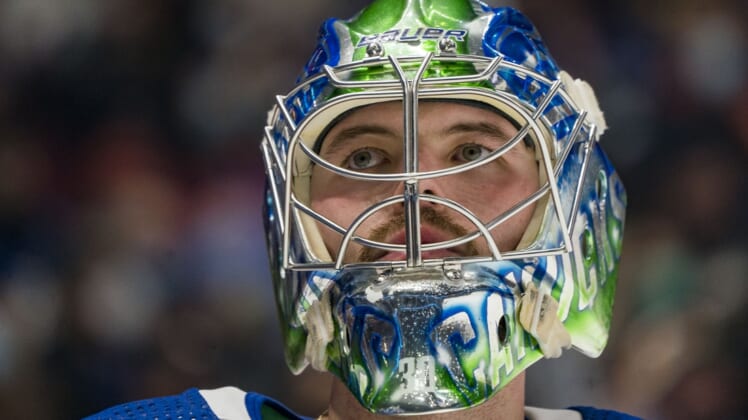 Jan 21, 2022; Vancouver, British Columbia, CAN; Vacnouver Canucks goalie Spencer Martin (30) in action against the Florida Panthers in the second period at Rogers Arena. Mandatory Credit: Bob Frid-USA TODAY Sports