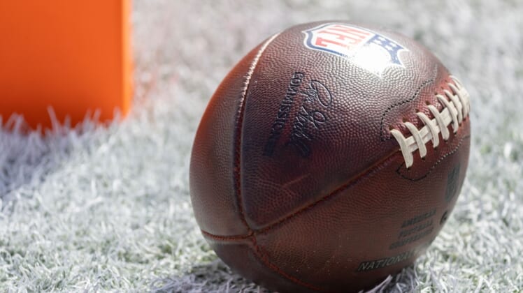 Jan 23, 2022; Tampa, Florida, USA; An official NFL football sits in the endzone before the game between the Tampa Bay Buccaneers and the Los Angeles Rams during a NFC Divisional playoff football game at Raymond James Stadium. Mandatory Credit: Matt Pendleton-USA TODAY Sports