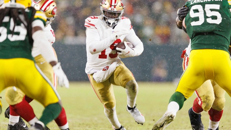 Jan 22, 2022; Green Bay, Wisconsin, USA; San Francisco 49ers wide receiver Deebo Samuel (19) during a NFC Divisional playoff football game against the Green Bay Packers at Lambeau Field. Mandatory Credit: Jeff Hanisch-USA TODAY Sports