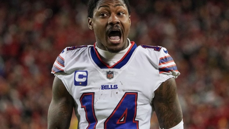 Jan 23, 2022; Kansas City, Missouri, USA; Buffalo Bills wide receiver Stefon Diggs (14) reacts to a call against the Kansas City Chiefs during an AFC Divisional playoff football game at GEHA Field at Arrowhead Stadium. Mandatory Credit: Denny Medley-USA TODAY Sports