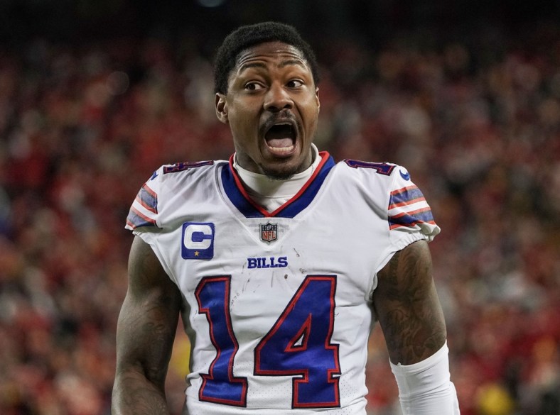 Jan 23, 2022; Kansas City, Missouri, USA; Buffalo Bills wide receiver Stefon Diggs (14) reacts to a call against the Kansas City Chiefs during an AFC Divisional playoff football game at GEHA Field at Arrowhead Stadium. Mandatory Credit: Denny Medley-USA TODAY Sports