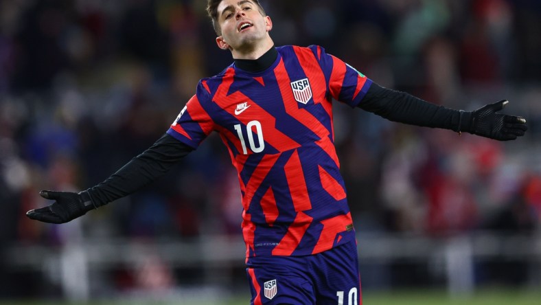 Feb 2, 2022; St. Paul, Minnesota, USA; United States forward Christian Pulisic (10) celebrates after scoring a goal against Honduras during a CONCACAF FIFA World Cup Qualifier soccer match at Allianz Field. Mandatory Credit: Harrison Barden-USA TODAY Sports