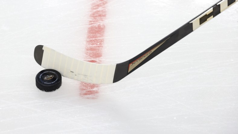 Feb 5, 2022; Las Vegas, Nevada, USA; A view of the All-Star logo on a game puck during warm ups prior to the 2022 NHL All-Star Game at T-Mobile Arena. Mandatory Credit: Aaron Doster-USA TODAY Sports