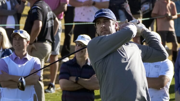 Feb 9, 2022; Scottsdale, AZ, USA;  Green Bay Packers quarterback Aaron Rodgers hits from the 11th tee box during the WM Phoenix Open Annexus Pro-Am at TPC Scottsdale. Mandatory Credit: Cheryl Evans-USA TODAY NETWORK