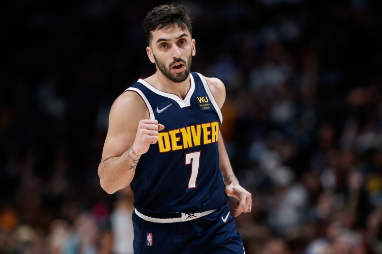 Feb 14, 2022; Denver, Colorado, USA; Denver Nuggets guard Facundo Campazzo (7) gestures after a play in the second quarter against the Orlando Magic at Ball Arena. Mandatory Credit: Isaiah J. Downing-USA TODAY Sports