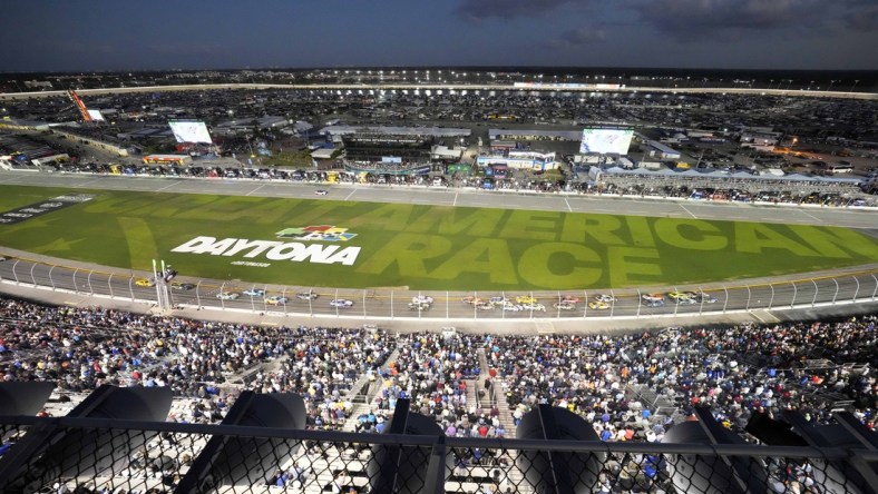 Feb 20, 2022; Daytona Beach, Florida, USA; NASCAR Cup Series driver Austin Cindric (2) leads the pack through the trioval during the Daytona 500 at Daytona International Speedway. Mandatory Credit: John David Mercer-USA TODAY Sports