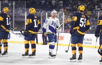 Feb 26, 2022; Nashville, Tennessee, USA; Tampa Bay Lightning center Steven Stamkos (91) leads the team through the hand shake line after a win against the Nashville Predators in a Stadium Series ice hockey game at Nissan Stadium. Mandatory Credit: Christopher Hanewinckel-USA TODAY Sports