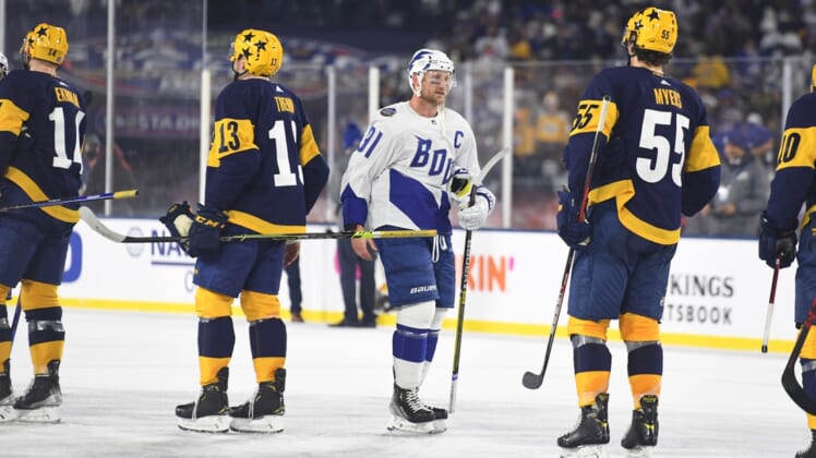 Feb 26, 2022; Nashville, Tennessee, USA; Tampa Bay Lightning center Steven Stamkos (91) leads the team through the hand shake line after a win against the Nashville Predators in a Stadium Series ice hockey game at Nissan Stadium. Mandatory Credit: Christopher Hanewinckel-USA TODAY Sports