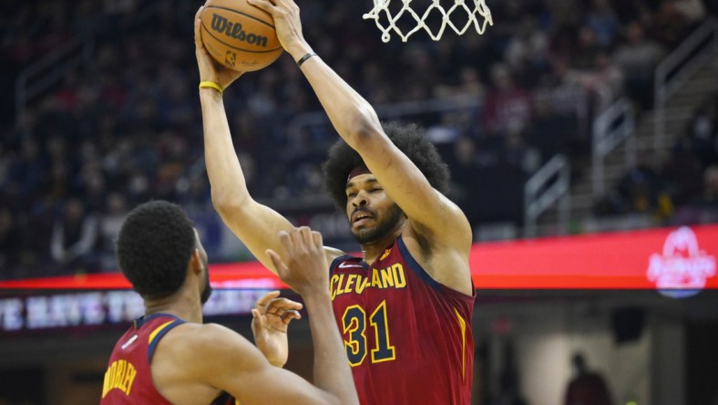 Mar 2, 2022; Cleveland, Ohio, USA; Cleveland Cavaliers center Jarrett Allen (31) grabs a rebound in the second quarter against the Charlotte Hornets at Rocket Mortgage FieldHouse. Mandatory Credit: David Richard-USA TODAY Sports