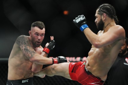 Mar 5, 2022; Las Vegas, Nevada, UNITED STATES; Colby Covington (red gloves) fights Jorge Masvidal (blue gloves) during UFC 272 at T-Mobile Arena. Mandatory Credit: Stephen R. Sylvanie-USA TODAY Sports