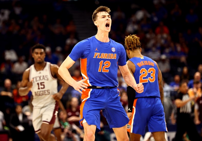 Mar 10, 2022; Tampa, FL, USA; Florida Gators forward Colin Castleton (12) gets pumped up against the Texas A&M Aggies during the first half at Amalie Arena. Mandatory Credit: Kim Klement-USA TODAY Sports