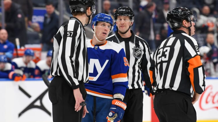 Mar 10, 2022; Elmont, New York, USA; New York Islanders center Casey Cizikas (53) reacts after with a high sticking call during the game against the Columbus Blue Jackets during the second period at UBS Arena. Mandatory Credit: Dennis Schneidler-USA TODAY Sports